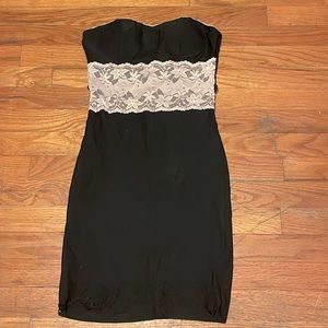 vintage type dress has a cute little cut up in the front of the dress only